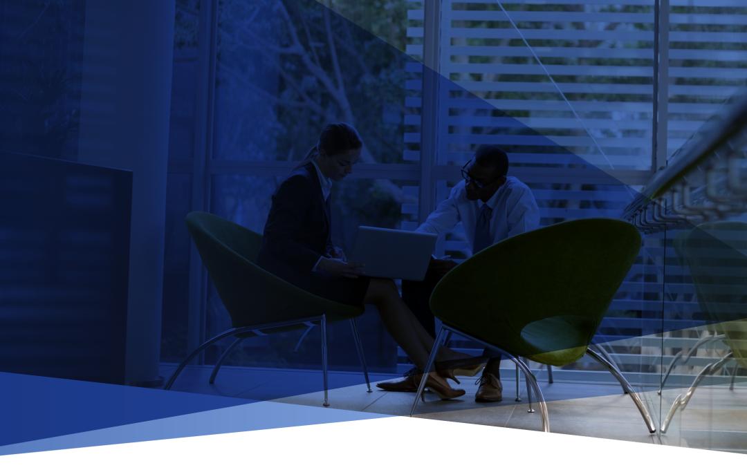 two people in chairs talking